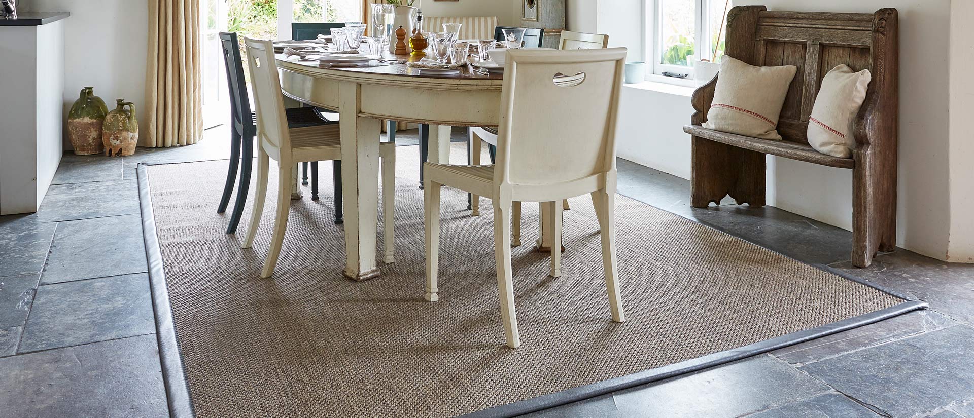 About us, sisal rugs in a dining room