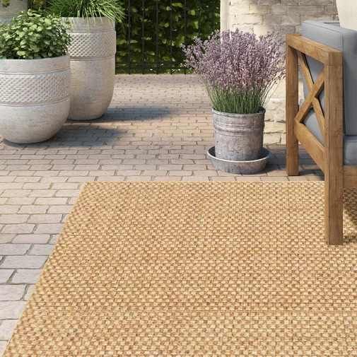 Outdoor sisal rugs present in beautiful outdoor space