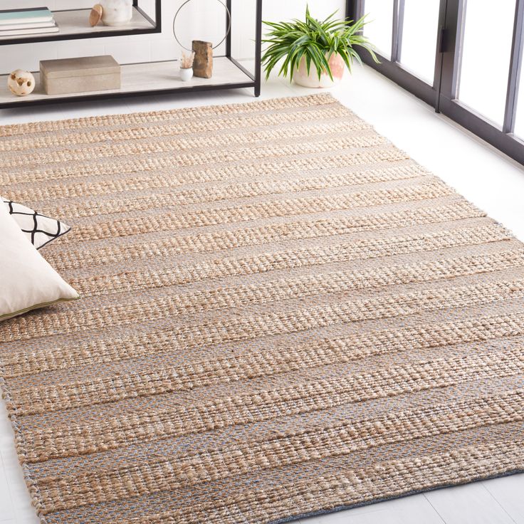 Seagrass Rugs Dubai in brown color placed in living area