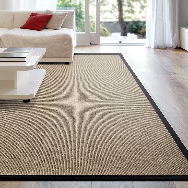 Sisal rugs are placed in a living room and enhance the overall beauty of home