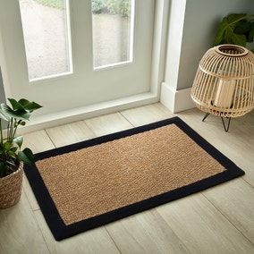 door mat placed on entry area of room