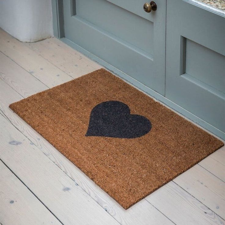 Sisal door mats placed in entryway.
