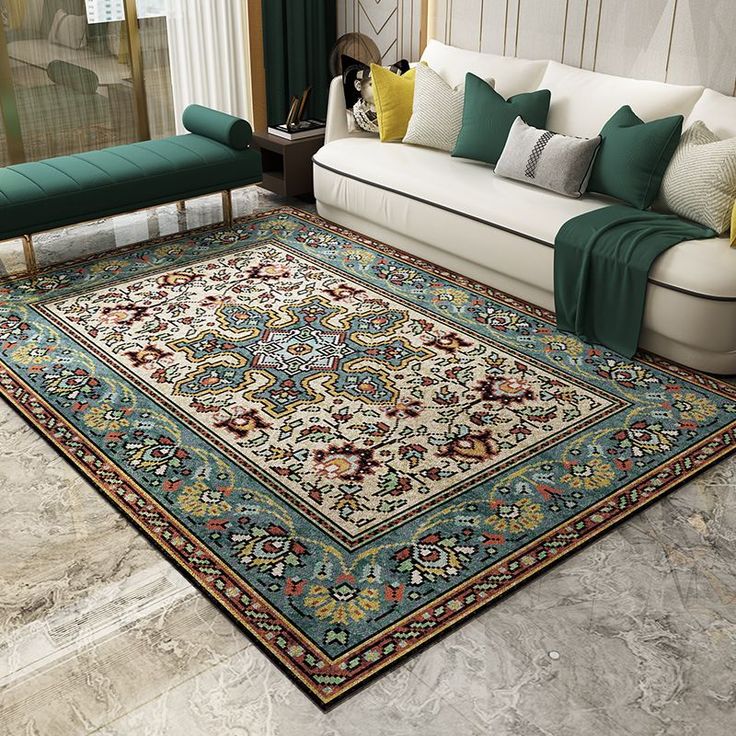 Persian carpets in green color placed in a drawing room