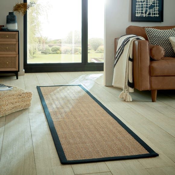 extra long door mat placed on entry area of home